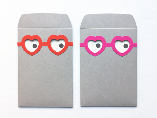 2 x the villa envelope and its heart glasses